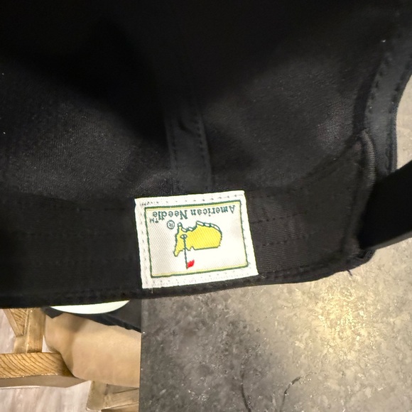 Black Cap with Yellow A.N.G.C Embroidery